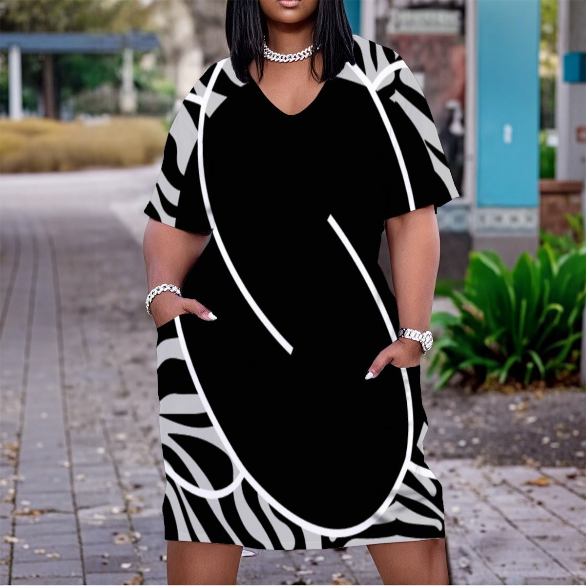 Women's Zebra Print V-Neck Dress with Solid Black Center, Line Art & Pockets
